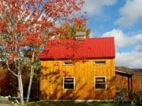 Red chalet exterior during fall
