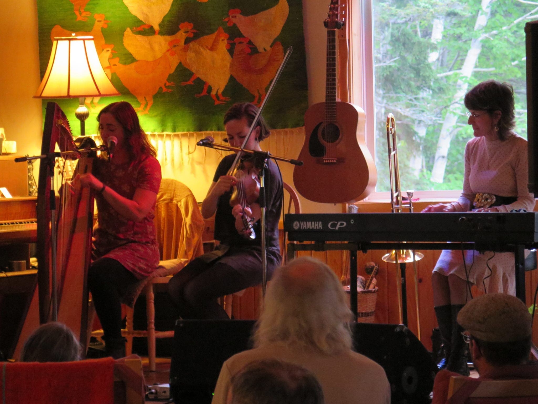 group of musicians performing indoors.