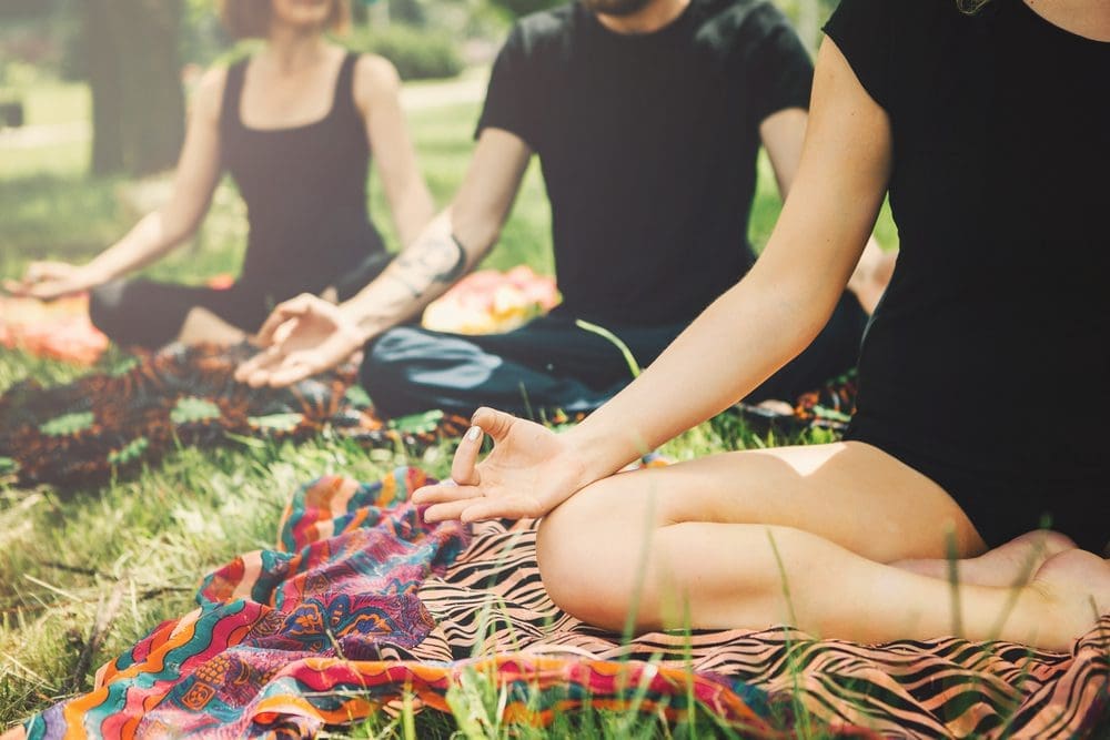 A group meditates during yoga retreat in Nova Scotia.