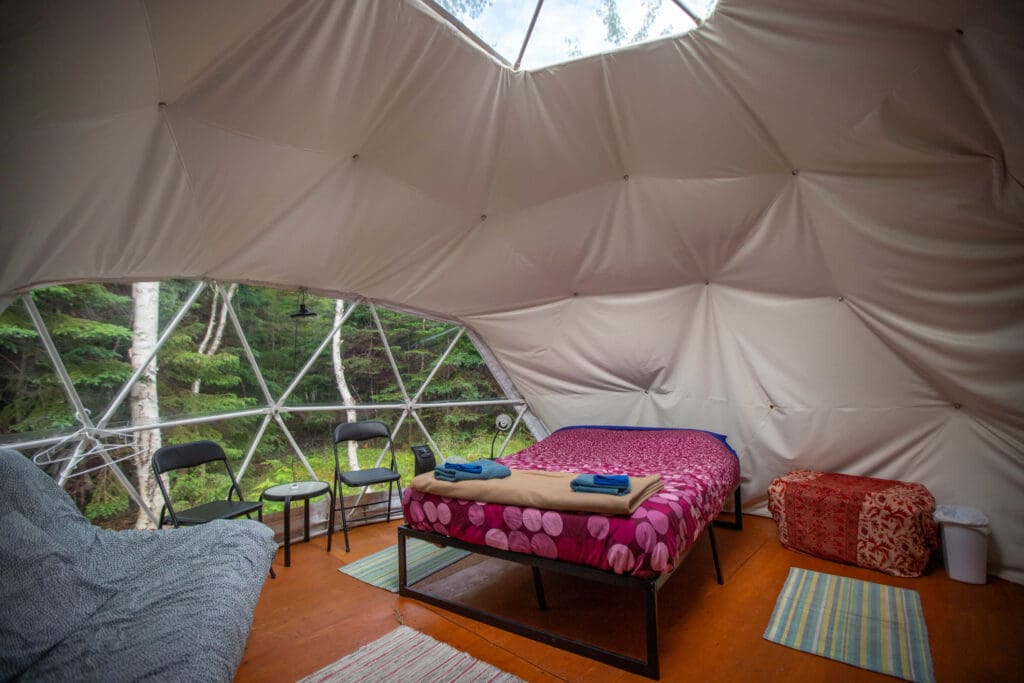 Glamping Cape Breton: Interior view of a geodesic dome for glamping along the Cabot Trail.