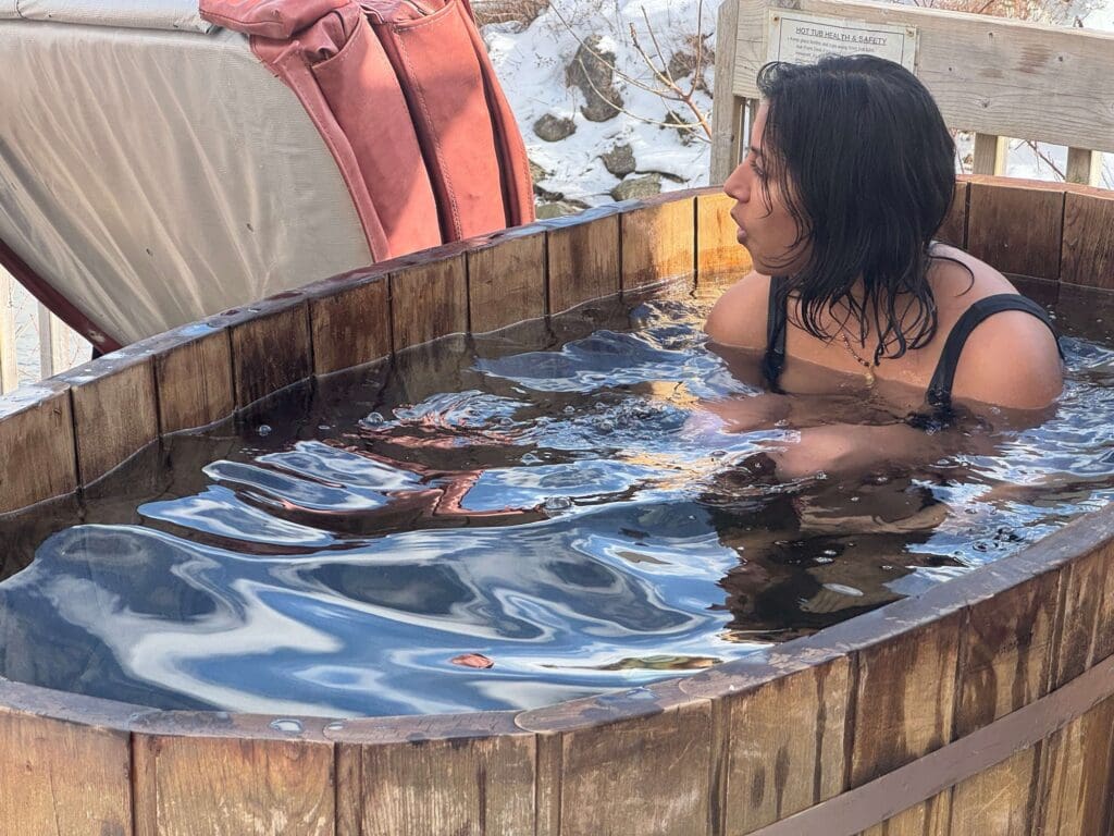 Experience The Wilderness Wellness Spa at Cabot Shores Zayna doing cold plunge