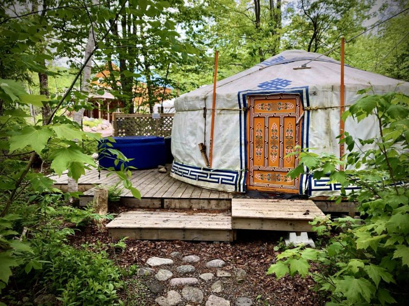 Stay in Large Mongolian Yurts The exterior view of a yurt at Cabot Shores Wilderness Resort on Cape Breton Island, Nova Scotia.