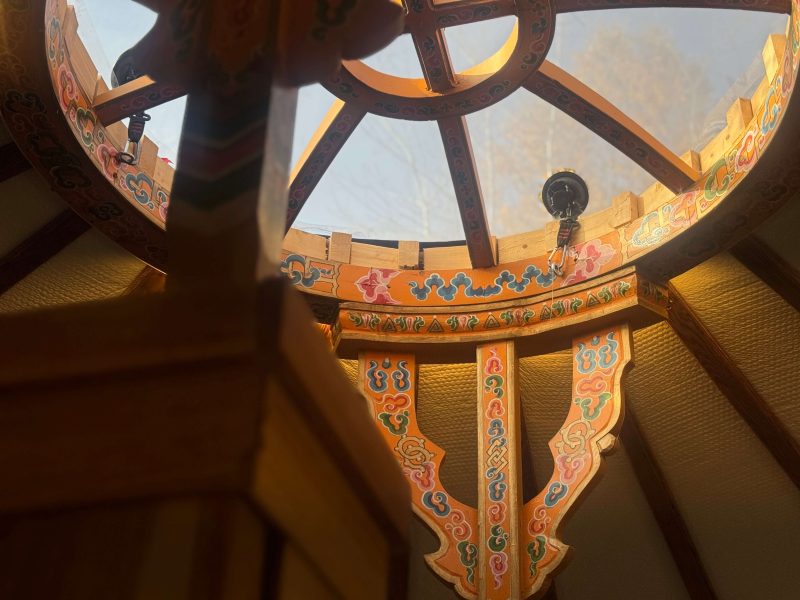 The Highlands Yurt at Cabot Shores Morning light streaming through the Mongolian-inspired tono ceiling