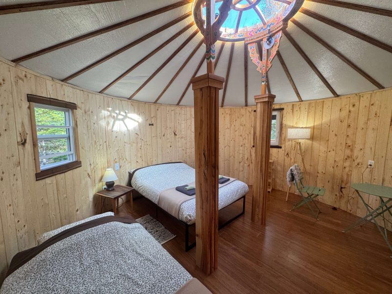 The Highlands Yurt at Cabot Shores Morning light streaming through the tono opening in the Highland Yurt roof